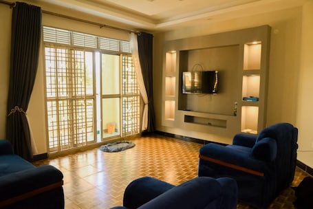 Comfort Apartment, Garden View | Living area