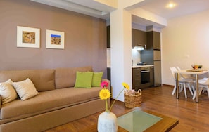 Comfort Apartment, 1 Bedroom, Garden View | Living area | 32-inch Smart TV with satellite channels - Elounda Colour Apartments (Elounda)