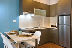 Comfort Apartment, 2 Bedrooms, Balcony, Partial Sea View | Private kitchen | Stovetop, espresso maker, toaster, high chair