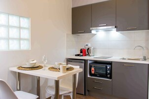 Superior Studio Suite, Mobility Accessible, City View | Private kitchen | Highchair, cookware/dishes/utensils