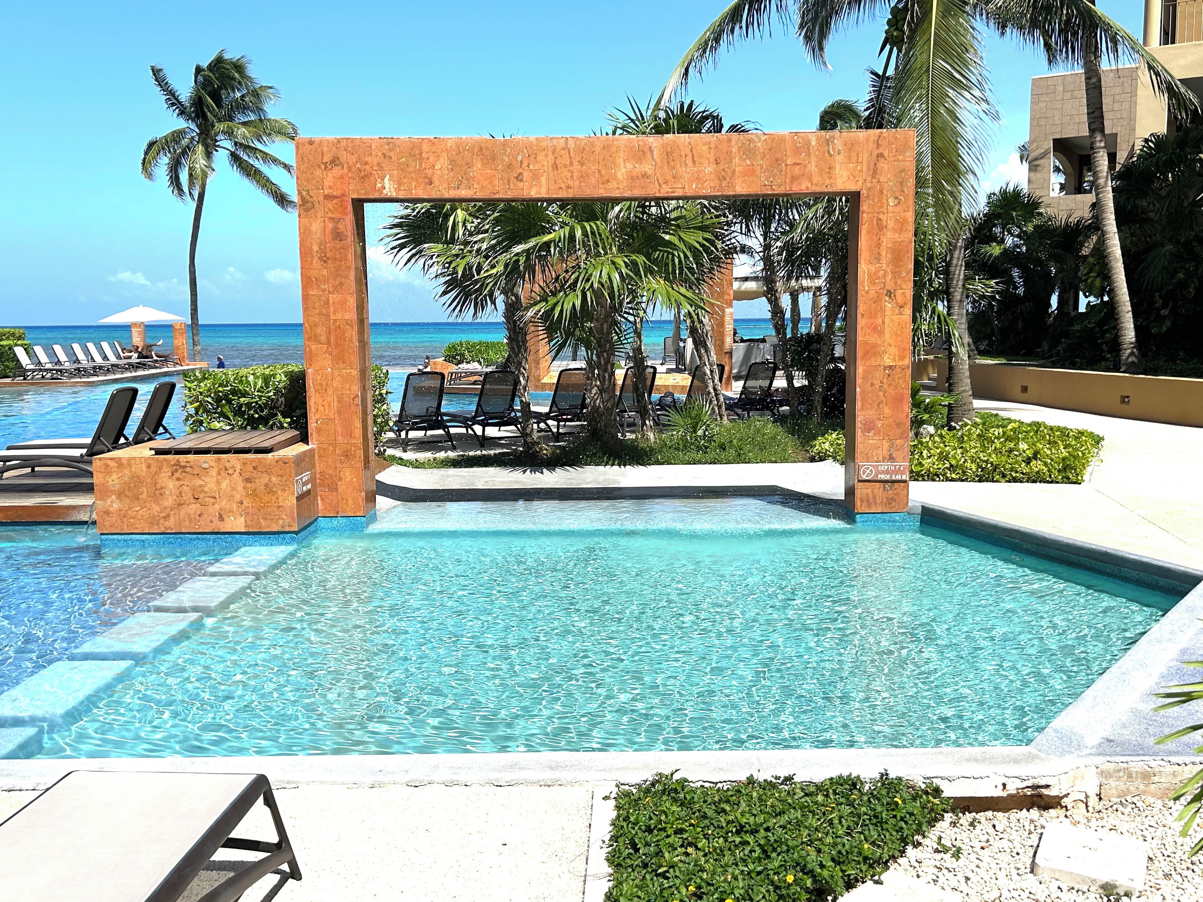 Outdoor pool, pool umbrellas, pool loungers