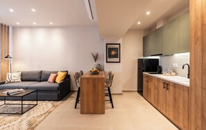 Signature Apartment, Balcony | Living area
