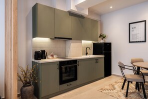 Apartamento Grand, 2 camas de matrimonio | Cocina privada | Placa de cocina y utensilios de cocina