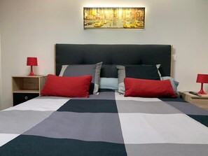 1 habitación, tabla de planchar con plancha, wifi y ropa de cama 