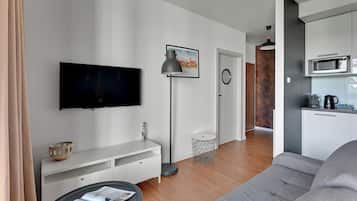 Apartemen Deluks, balkon, pemandangan sungai | Area keluarga | TV layar datar