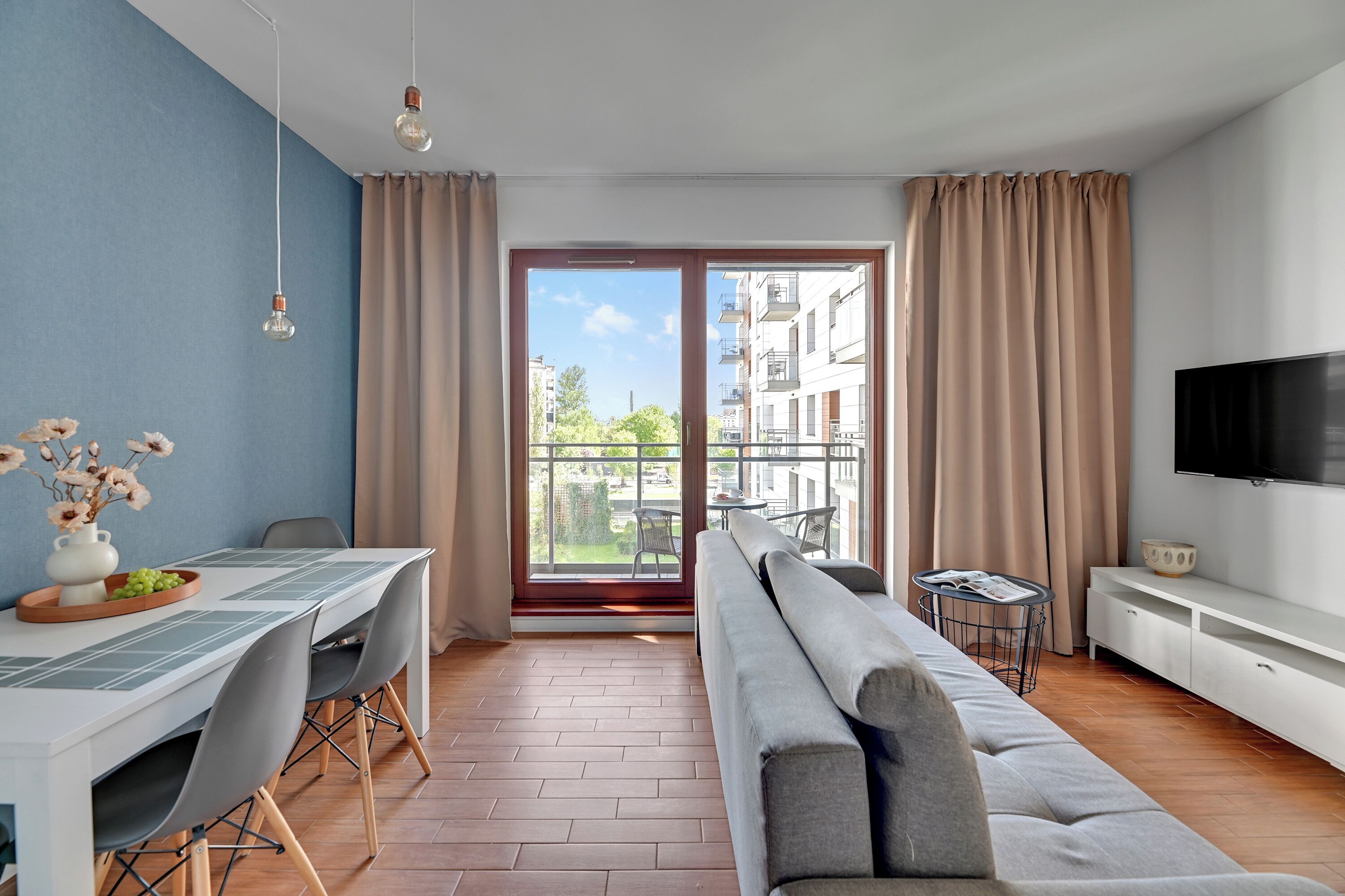 Deluxe Apartment, Balcony, River View | Living area | Flat-screen TV