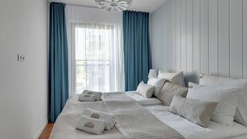 Deluxe Apartment, Balcony, River View | Living area | Flat-screen TV