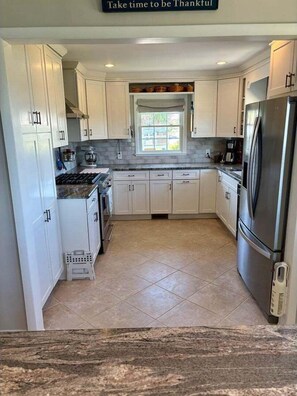 Private kitchen - Discover "Island Time" at Holden Beach: an oceanfront 3BR for 8 guests with private pool. (Holden Beach)