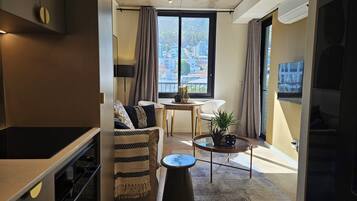 Compact One Bedroom | Living area | 50-inch Smart TV with satellite channels, Netflix, streaming services