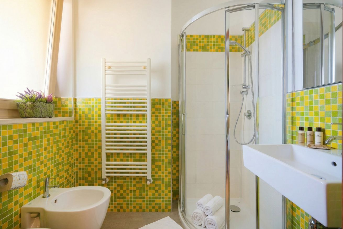 Shower, bidet, towels, shampoo