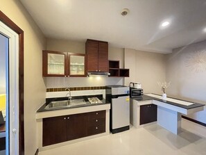 Appartement, vue partielle sur la mer | Cuisine privée