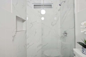 Shower, hair dryer, shampoo