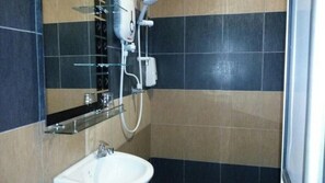 Shower, towels, soap, shampoo
