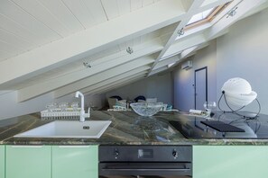 Appartement, 3 chambres | Cuisine privée | Réfrigérateur, un four, surface de cuisson, lave-vaisselle