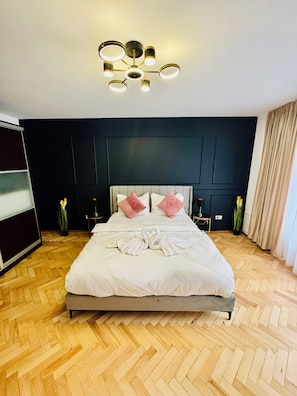 Desk, laptop workspace, blackout curtains, iron/ironing board