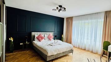 Desk, laptop workspace, blackout curtains, iron/ironing board