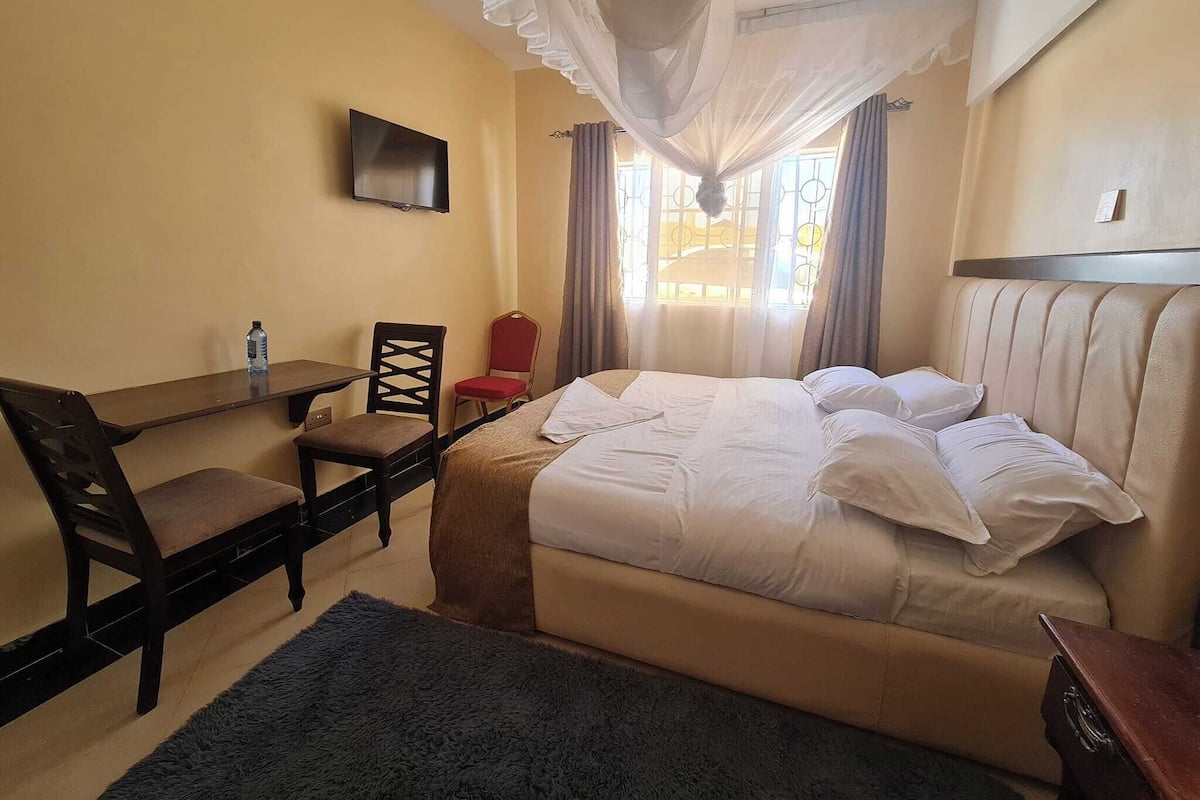 Quarto casal luxo, vista para o jardim | Wi-Fi de cortesia, roupa de cama