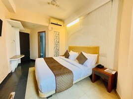 Quarto superior | Roupas de cama premium, Wi-Fi de cortesia, roupa de cama