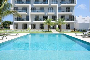 Outdoor pool, open 9:00 AM to 6:00 PM, pool umbrellas, sun loungers