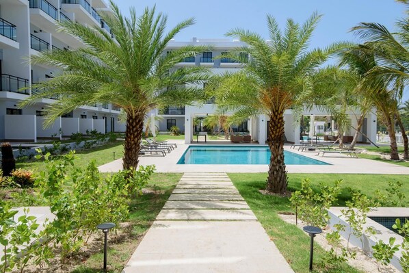 Outdoor pool, open 9:00 AM to 6:00 PM, pool umbrellas, sun loungers