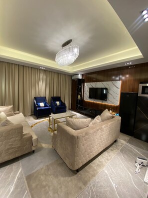 Lägenhet Deluxe - tillgänglighetsanpassat för personer med begränsad rörlighet - icke-rökare | Vardagsrum | Printers