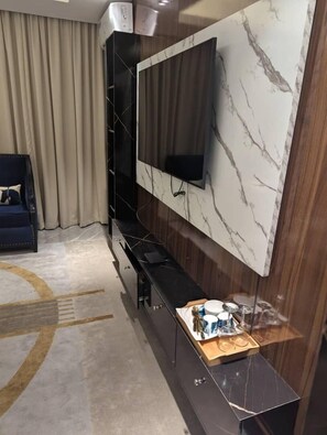 Lägenhet Deluxe - tillgänglighetsanpassat för personer med begränsad rörlighet - icke-rökare | Vardagsrum | Printers