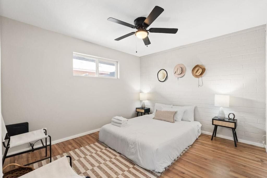 Desk, laptop workspace, blackout curtains, iron/ironing board