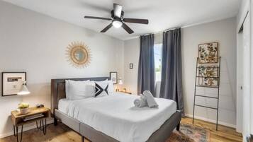 Apartment, 2 Bedrooms | Desk, laptop workspace, blackout drapes, iron/ironing board