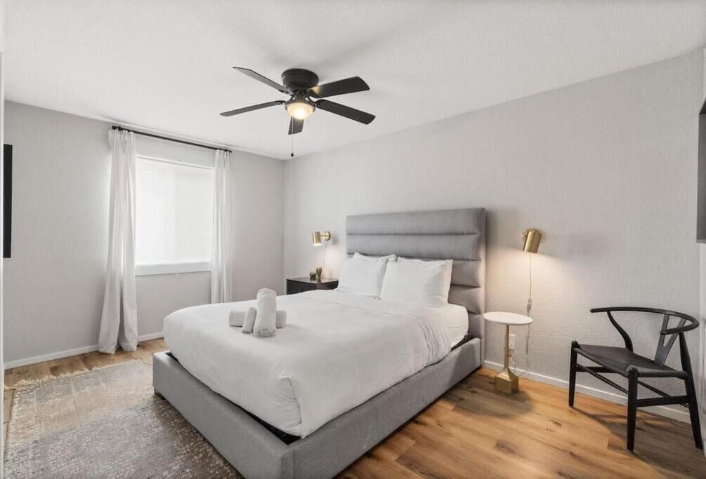 Desk, laptop workspace, blackout curtains, iron/ironing board