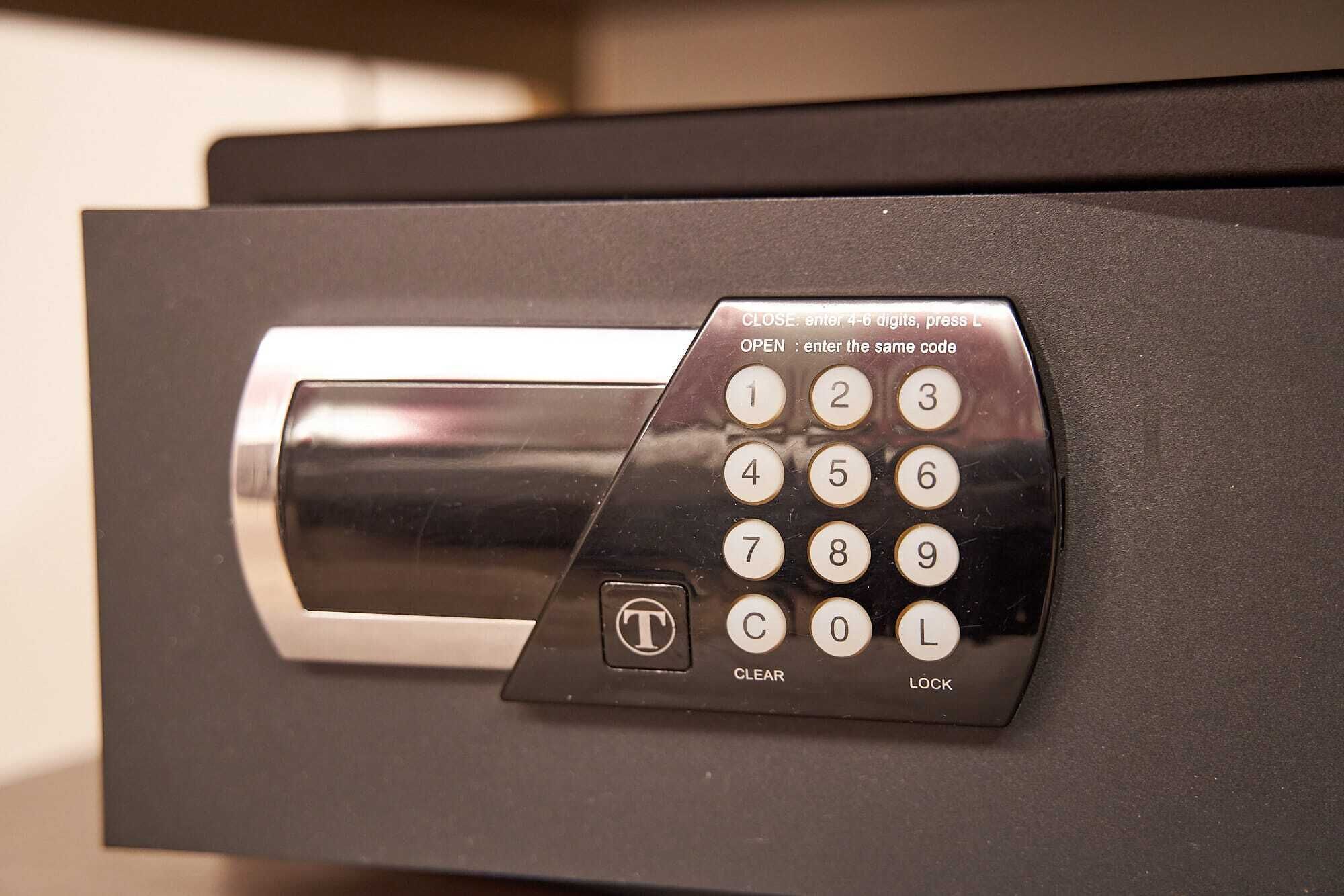 A keypad lock mechanism with a numeric keypad and a clear instruction panel.