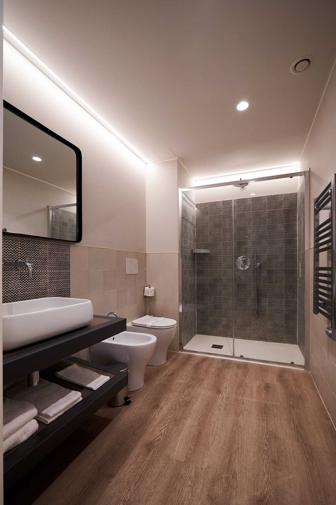 Family Studio Suite, Pool Access | Bathroom | Separate tub and shower, jetted tub, rainfall showerhead