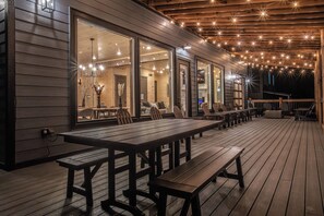 Outdoor dining - Lux 12 BR Cabin, Indoor Pool, Golf Rm, Sleeps 36 (Sevierville)