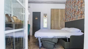 Rumah, 1 Tempat Tidur Queen dengan tempat tidur Sofa | Area keluarga | TV layar datar