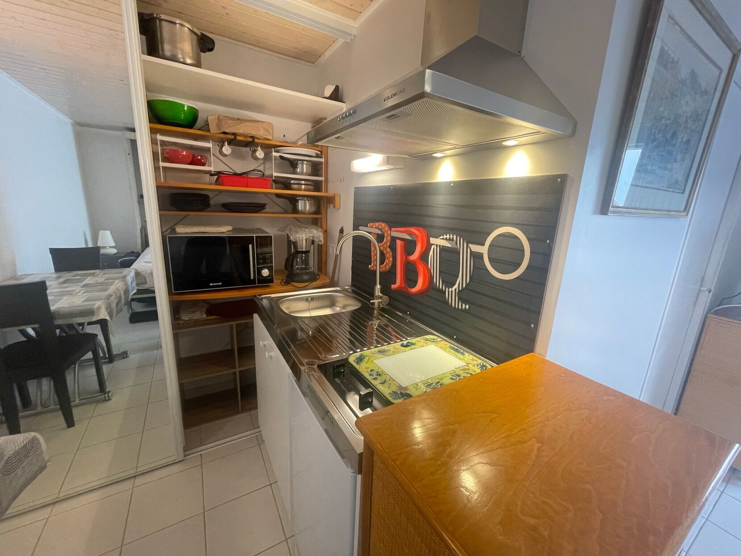 Fridge, microwave, stovetop, coffee/tea maker