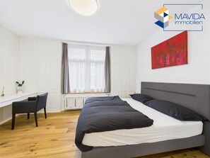 1 slaapkamer, een strijkplank/strijkijzer, internet, beddengoed