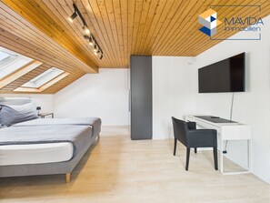 1 slaapkamer, een strijkplank/strijkijzer, wifi, beddengoed