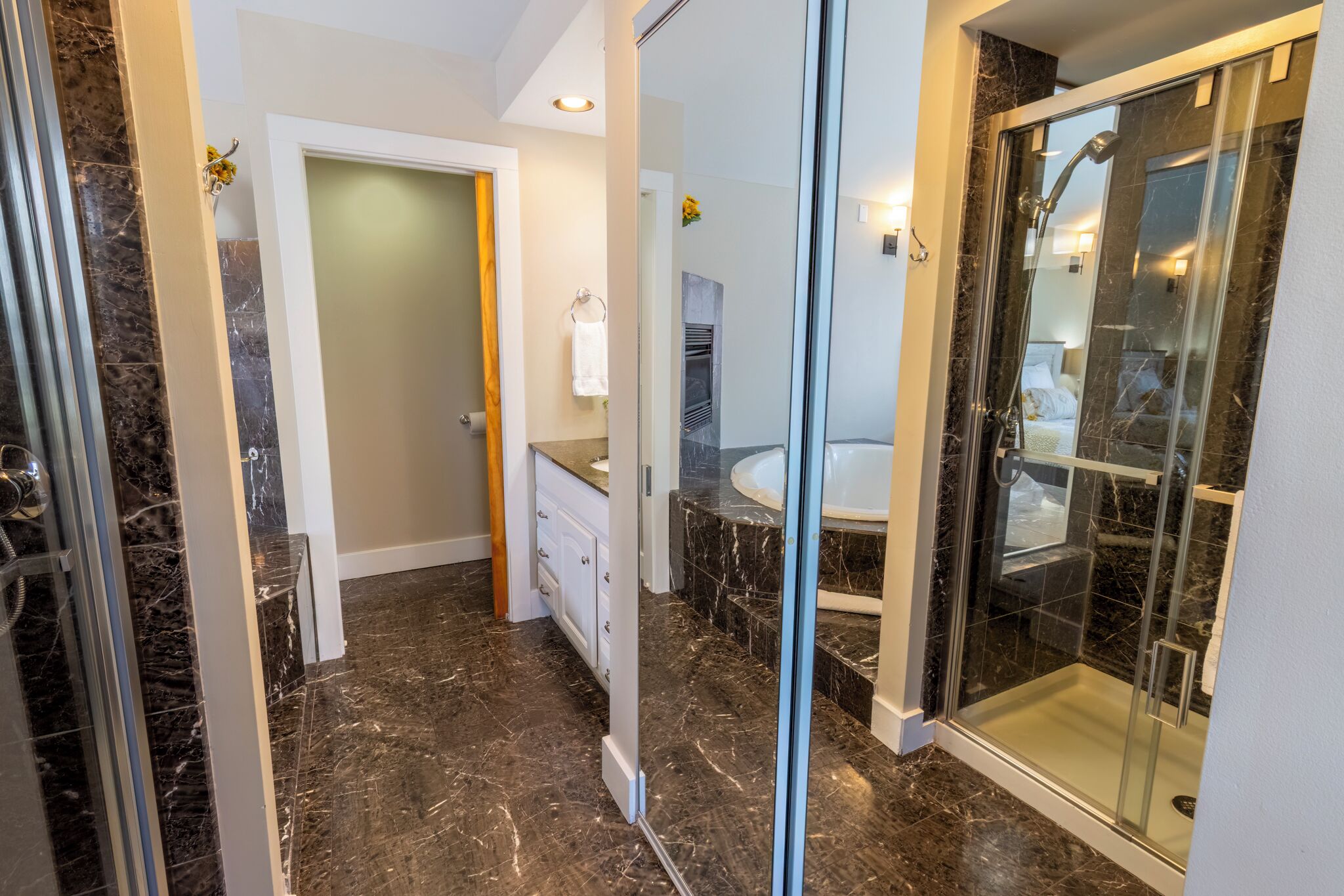 Shower, jetted tub, towels