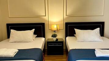 Couette en duvet d'oie, chambres insonorisées, fer et planche à repasser