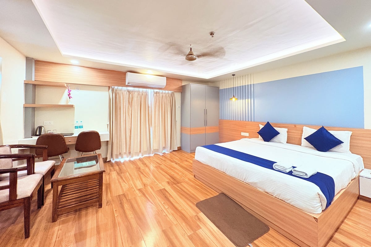 Quarto executivo, vista para a cidade | Wi-Fi de cortesia, roupa de cama
