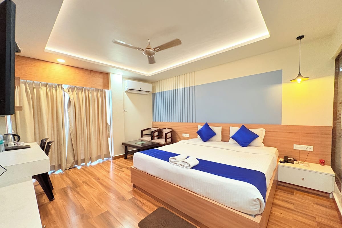 Quarto casal luxo, vista para a cidade | Wi-Fi de cortesia, roupa de cama