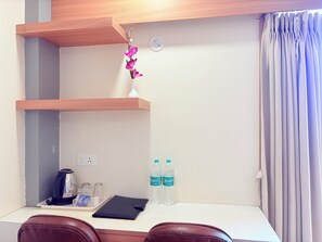 Quarto executivo, vista para a cidade | Wi-Fi de cortesia, roupa de cama