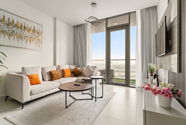 TV - First Class 1BR Home: Simple, Big, and Close to All the Fun Spots (Meydan)