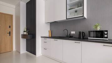 Fridge, microwave, stovetop, cookware/dishes/utensils