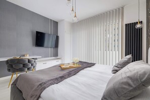 Desk, iron/ironing board, travel crib, WiFi