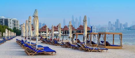 Private beach, white sand, sun-loungers, beach umbrellas