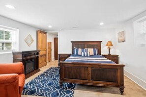 1 bedroom, desk, iron/ironing board, travel crib