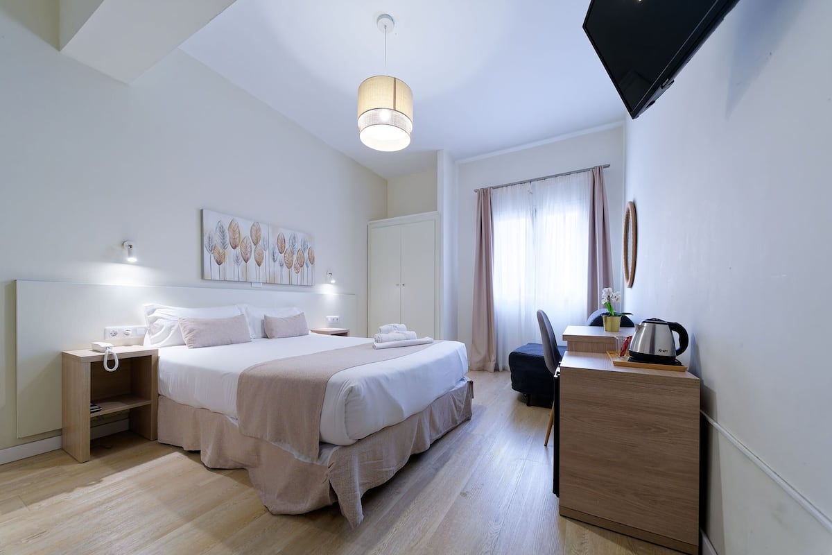 In-room safe, desk, blackout curtains, iron/ironing board (on request)