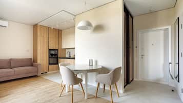 Design Apartment, Partial Sea View | Living area | 43-inch Smart TV with digital channels, Netflix, streaming services