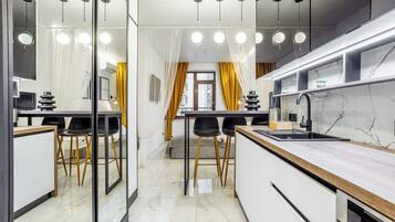 Luxury Studio Suite, Partial Sea View | Living area | 43-inch Smart TV with digital channels, Netflix, streaming services
