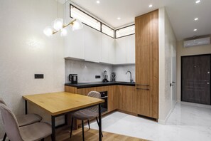 Business Apartment | Living area | 43-inch Smart TV with digital channels, Netflix, streaming services